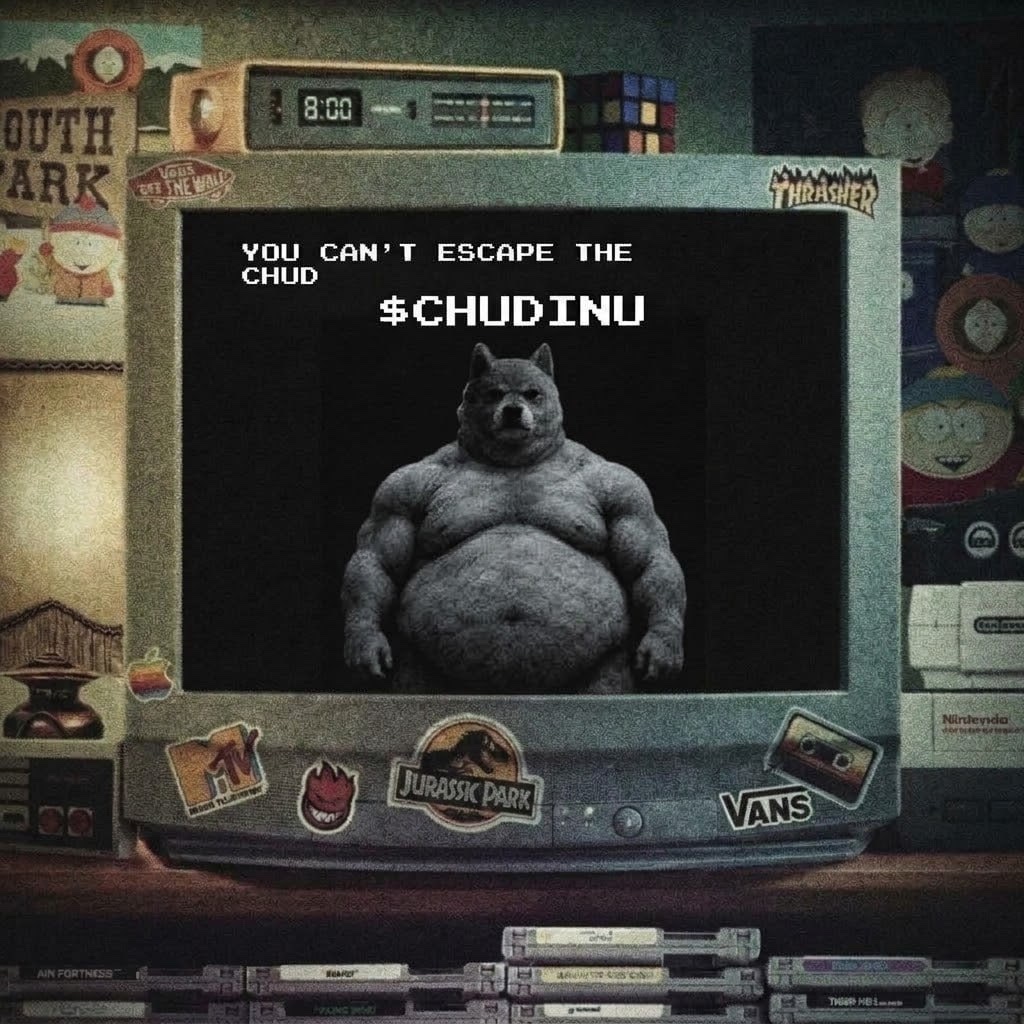 A CRT covered in stickers. On screen: you can’t escape the chud. $CHUDINU.